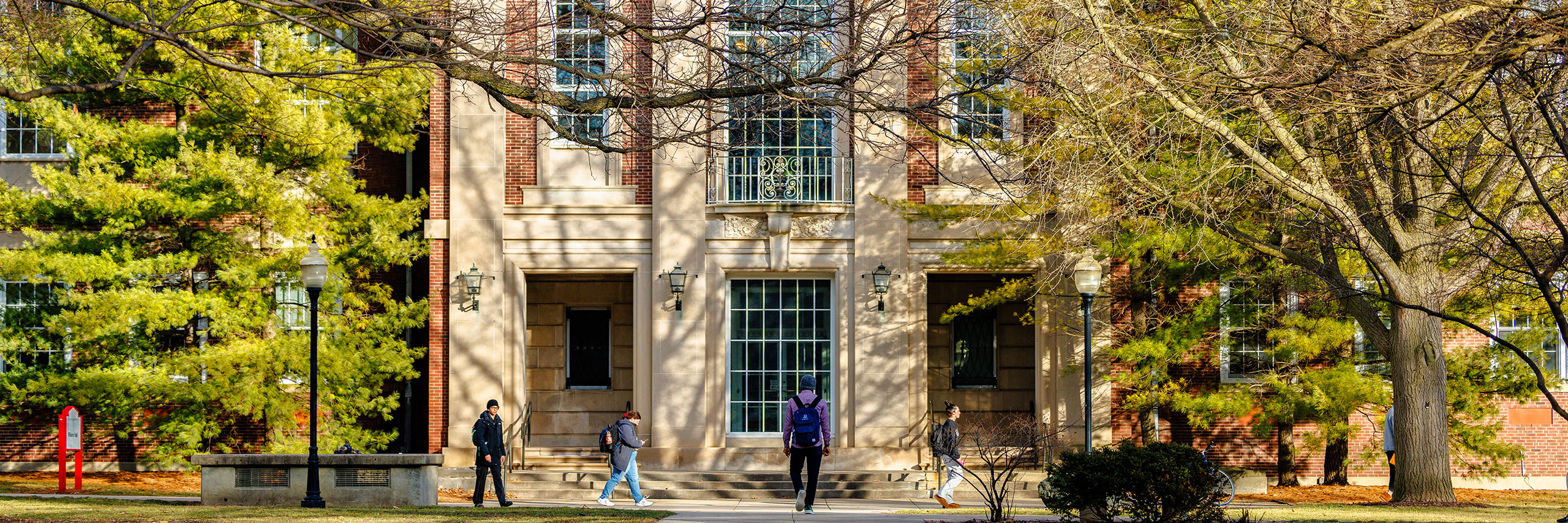 Students walking by the Williams Hall Building