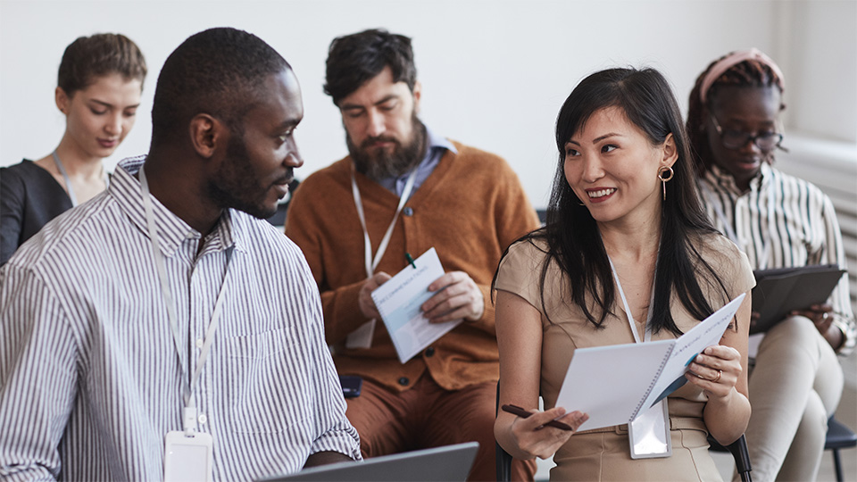 Faculty members together for a workshop