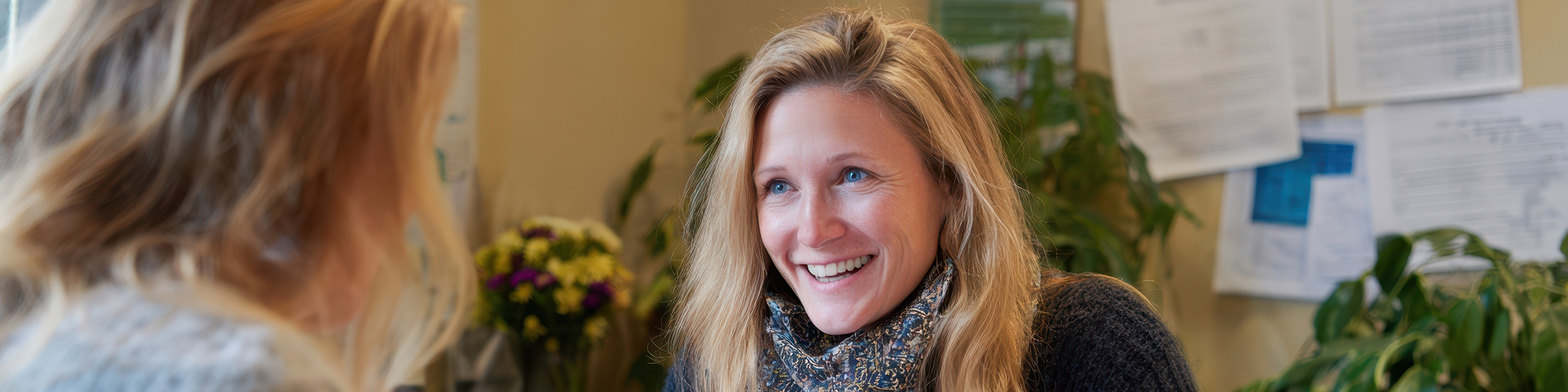 Woman consulting with another