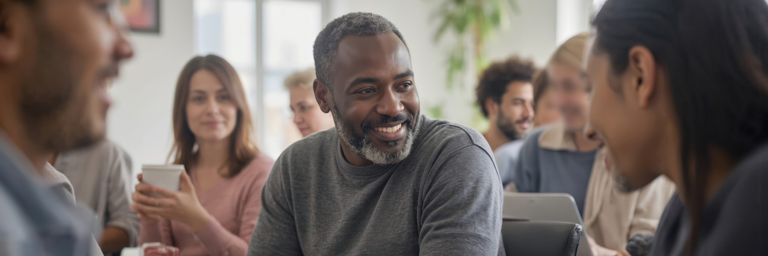 Group of people sitting together and chatting