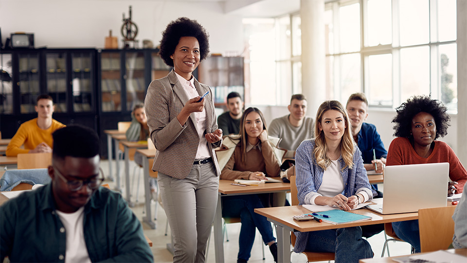 Teacher in a classroom with diverse students